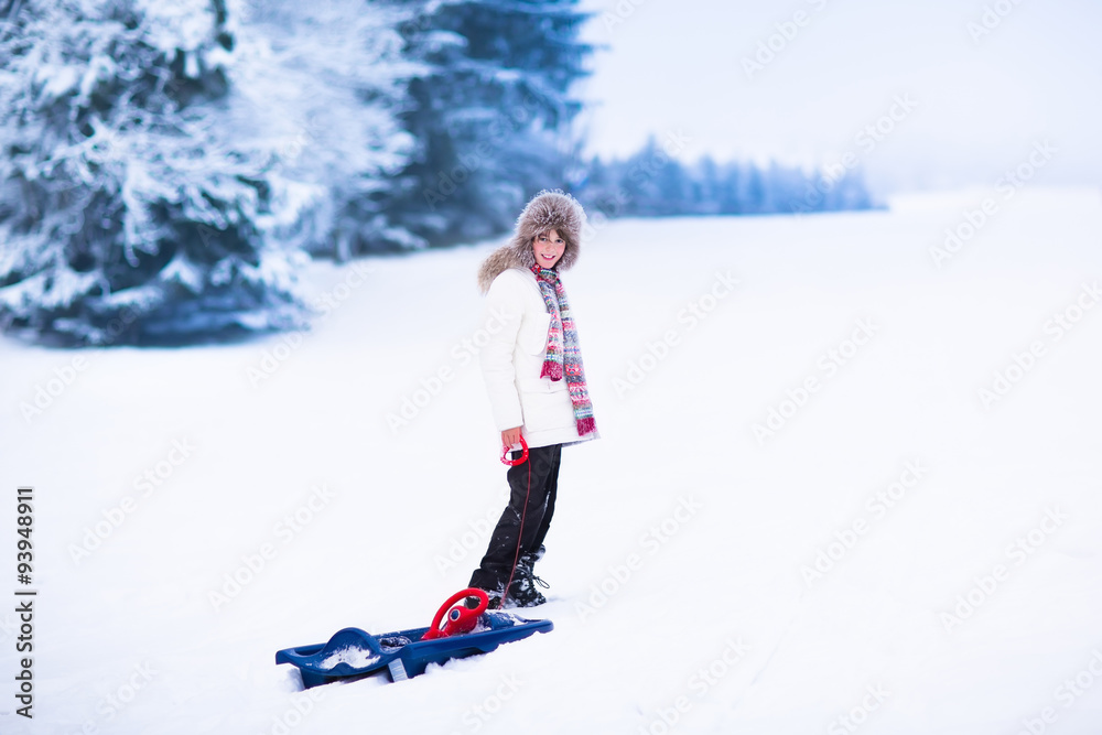 Happy child playing in snow