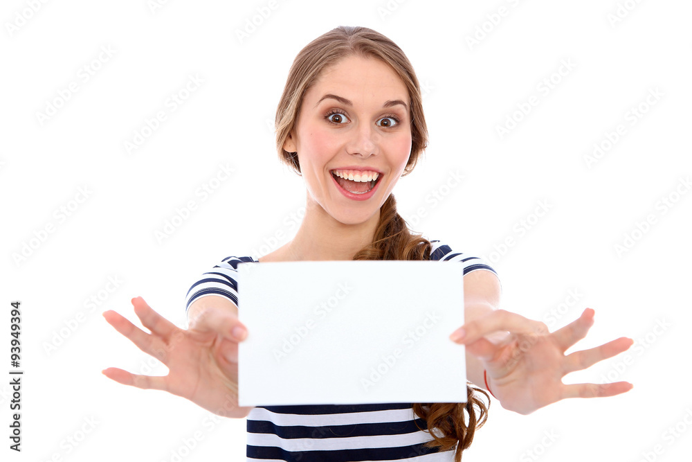 Student girl showing white blank sheet - copy space, isolated over background Student girl showing white blank sheet - copy space, isolated over background