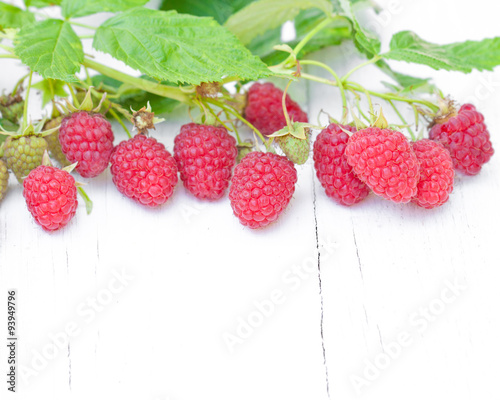 macro image of fresh raspberry on white table