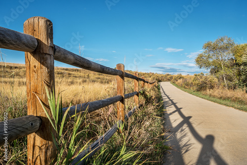 wooden fence and bike trail