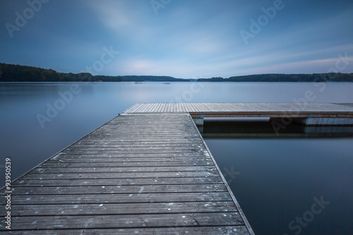 Fototapeta Naklejka Na Ścianę i Meble -  Wooden jetty on city beach of Olsztyn