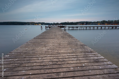 Fototapeta Naklejka Na Ścianę i Meble -  Wooden jetty on city beach of Olsztyn