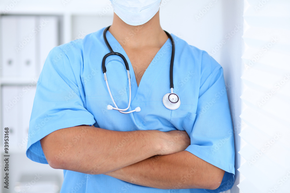 Unknown surgeon with stethoscope, crossed arms Unknown surgeon with stethoscope, crossed arms