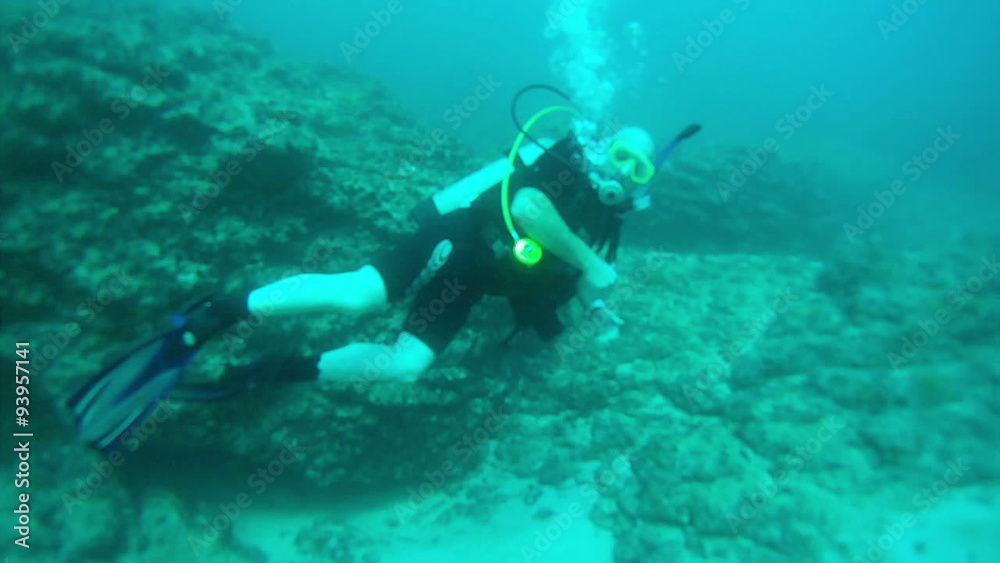 Scuba diver rocky reef Pacific Ocean Mexico HD 0027 Scuba diver rocky reef Pacific Ocean Mexico HD 0027