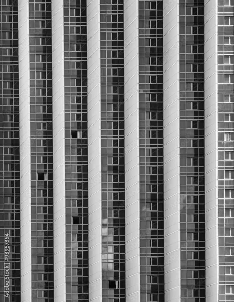 Side View of a High Rise Building. Abstract view of a modern skyscraper in  tones of black, white, and gray/grey. Stock Photo | Adobe Stock