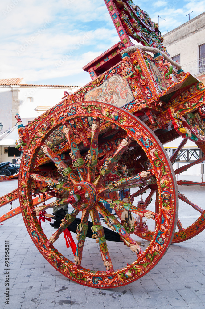 View of a typical colorful sicilian cart with its characteristic decorations