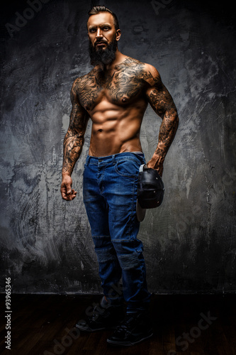 Full body portrait of muscular man.