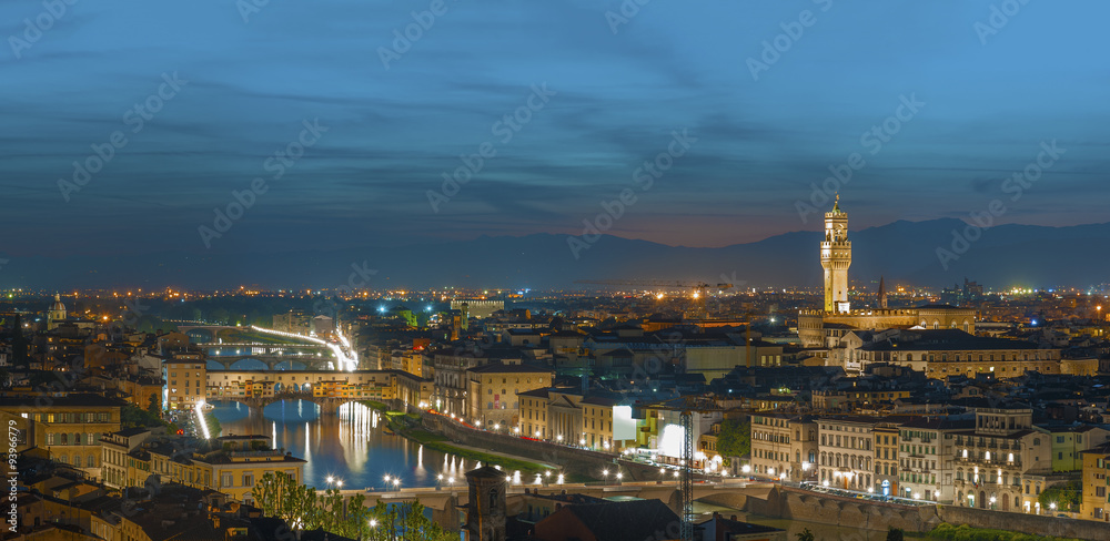 Florence city during sunset. Panoramic view to the river Arno, with Ponte Vecchio and  Palazzo Vecchio , Florence, Italy 