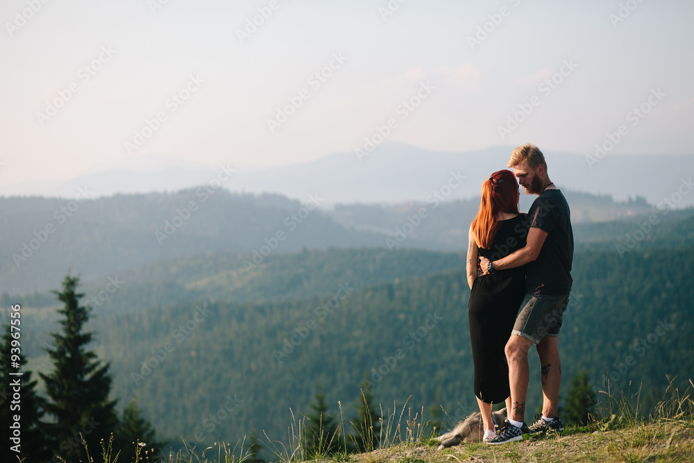 Photo of a couple in the mountains