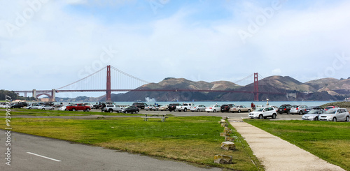 Parking lot with Golden Gate in the background.