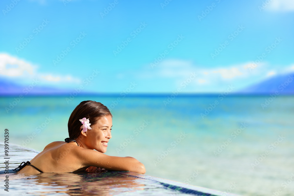 Relaxing pool woman on holidays vacation travel