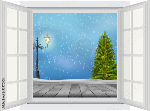 Open window of Christmas tree and lamp post on winter background