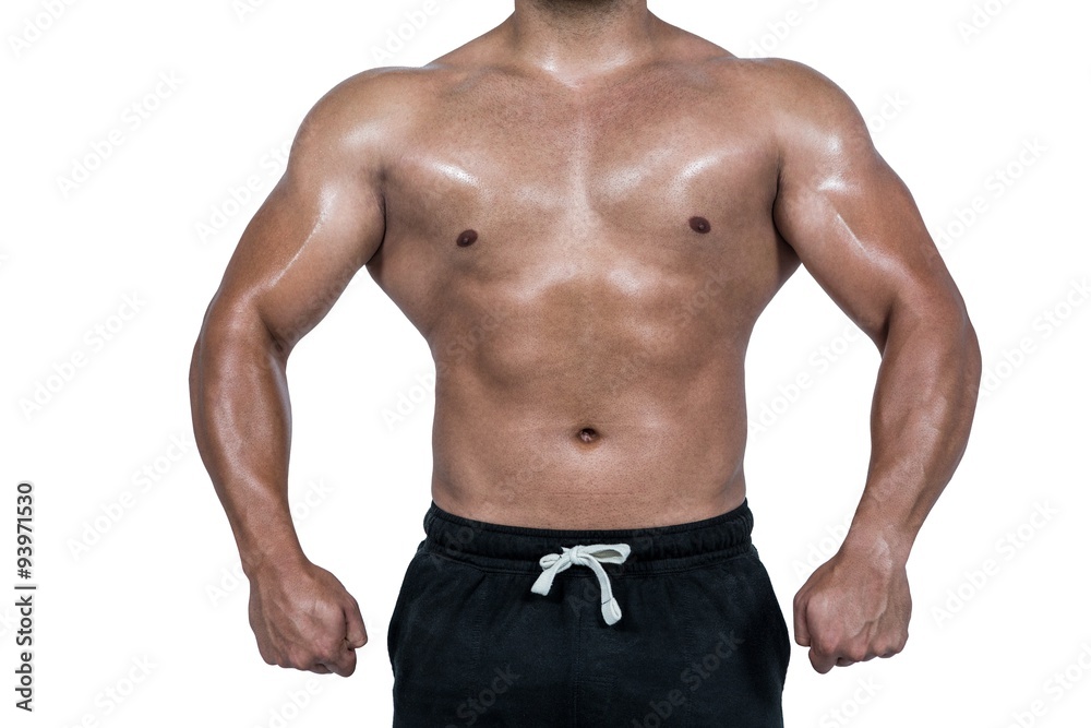 Obraz premium Muscular man flexing for camera