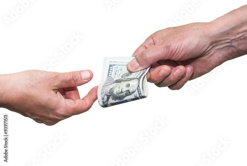 Close-up Hand giving  Us Dollars isolated on white