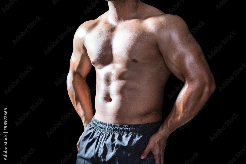Fototapeta premium Mid section of a bodybuilder man