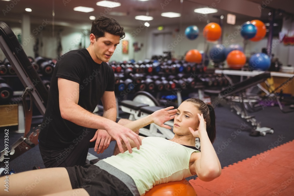 Fit woman working out with trainer Fit woman working out with trainer