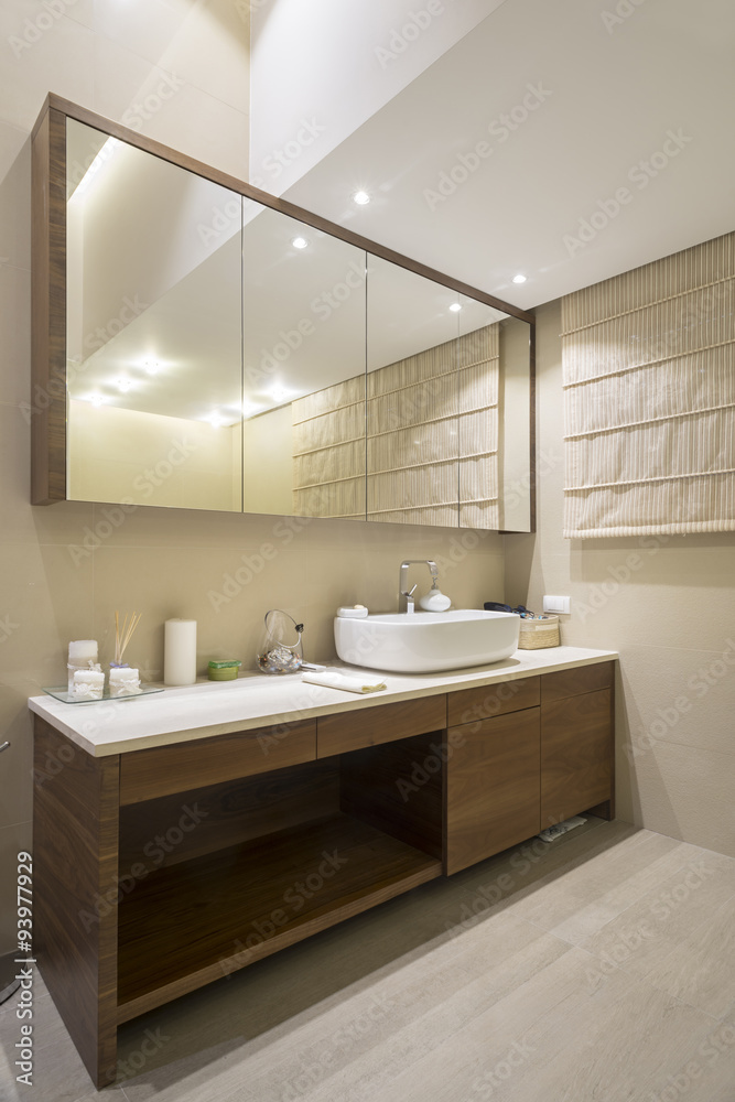 Bathroom interior with large mirror Bathroom interior with large mirror