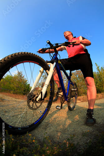 Mountain Bike cyclist riding single track at sunrise