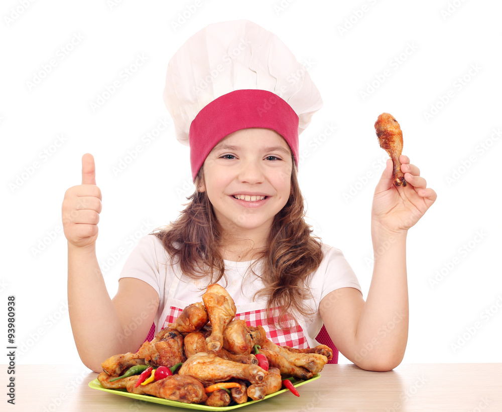 happy little girl cook with chicken drumstick and thumb up happy little girl cook with chicken drumstick and thumb up