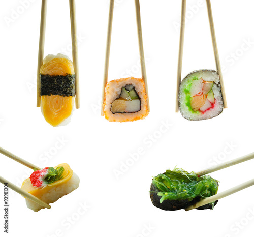 Sushi in chopsticks isolated on white background