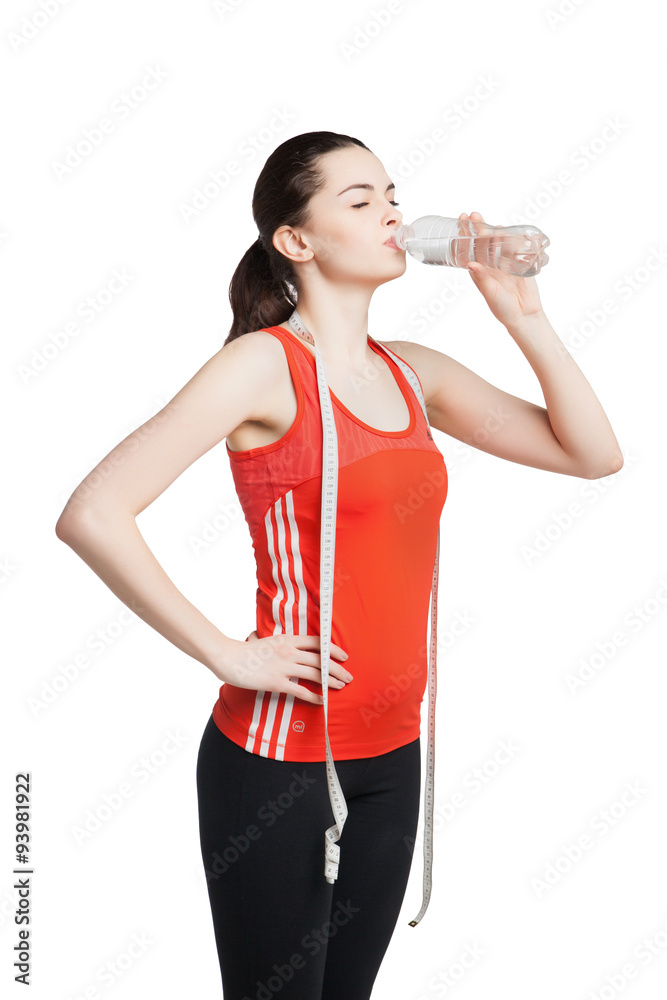 beautiful woman with measuring tape drinks water beautiful woman with measuring tape drinks water