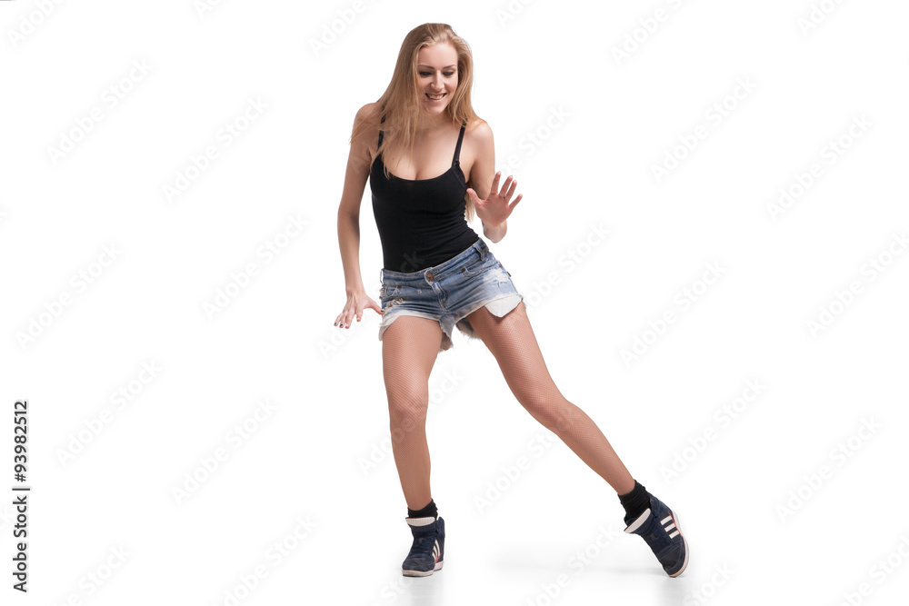 Young beautiful dancer posing on studio background Young beautiful dancer posing on studio background