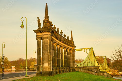 Glienicke Bridge over the River Havel at sunset. The USA and the Soviet Union used it four times to exchange captured spies during the Cold War. Spy bridge Brandenburg, Germany 