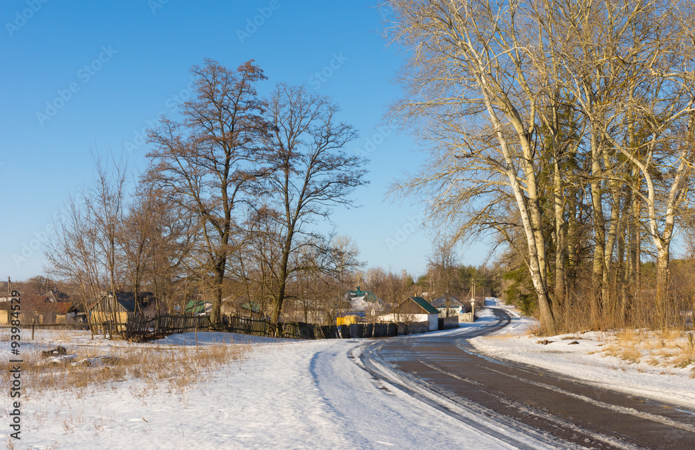 Winter landscape with road to Derevki village in central Ukrainian Winter landscape with road to Derevki village in central Ukrainian