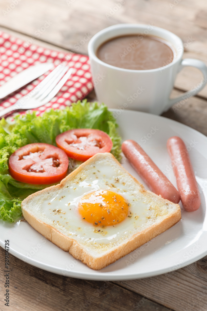Breakfast, Egg in a hole with sausage and coffee. Breakfast, Egg in a hole with sausage and coffee.