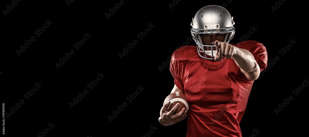Composite image of portrait sports player in red jersey pointing Composite image of portrait sports player in red jersey pointing