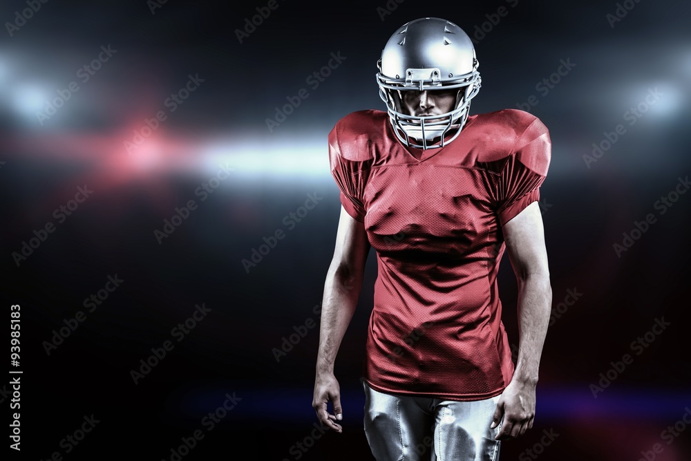 Composite image of confident american football player