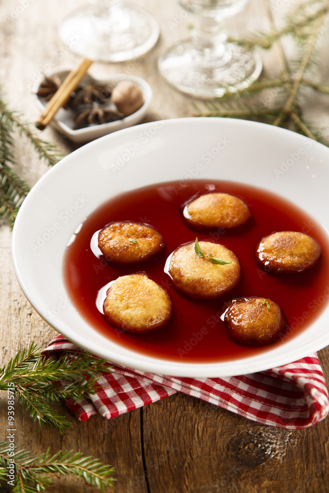 Sweet fried donuts in wine sauce Sweet fried donuts in wine sauce