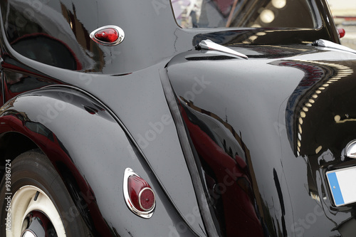 Rear view of a black classic car