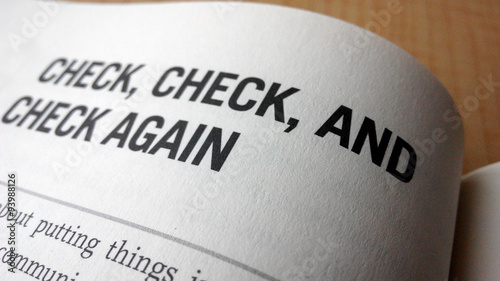 Check again word on a book