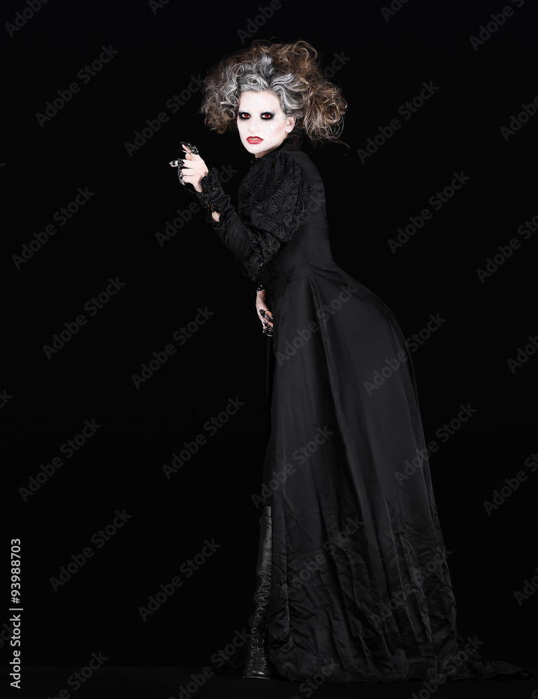 vampire woman with black gothic costume halloween concept