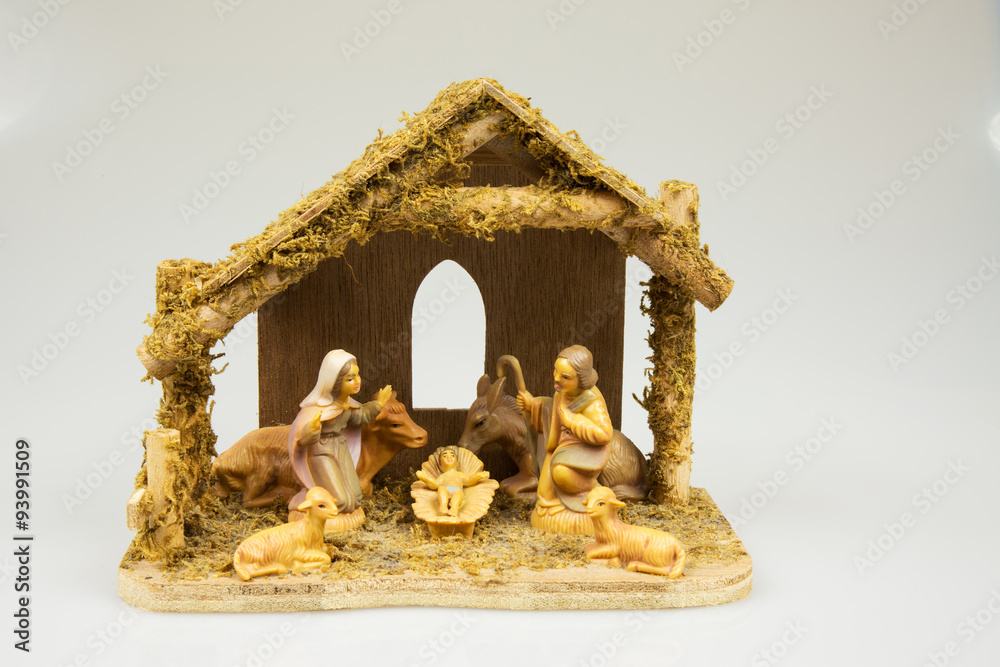 Old Christmas crib isolated on white background.Horizontal.