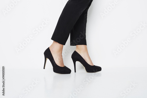 Woman in black high heels