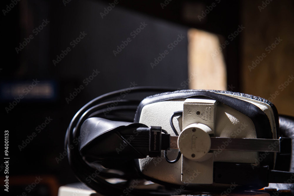 headphones, earphones for recording on a shelf in a recording studio headphones, earphones for recording on a shelf in a recording studio