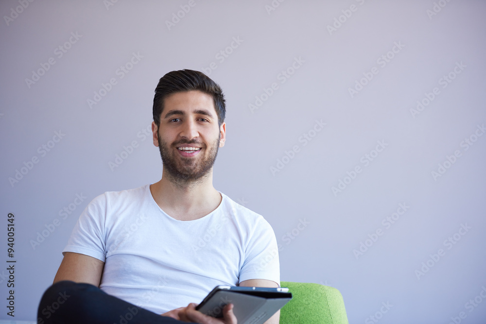 student working on tablet student working on tablet