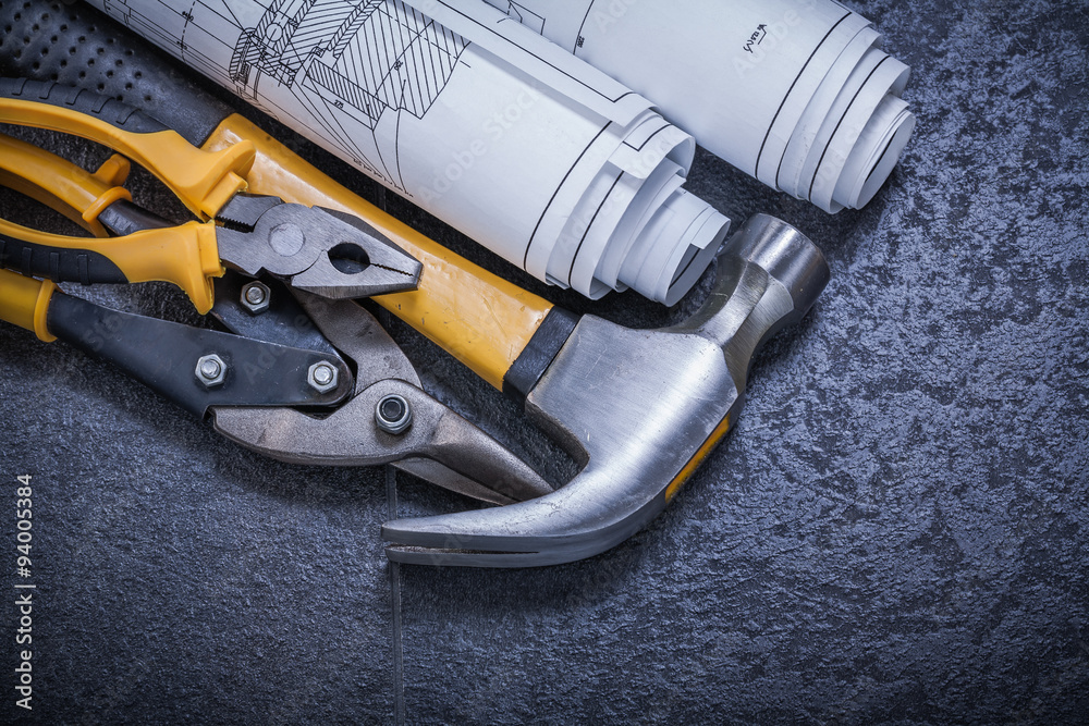Construction drawings steel cutter pliers claw hammer on black b Construction drawings steel cutter pliers claw hammer on black b