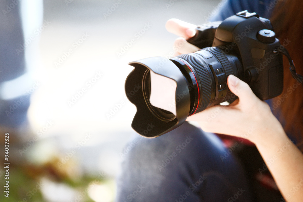 Holding a Full Frame Camera. Holding a Full Frame Camera.