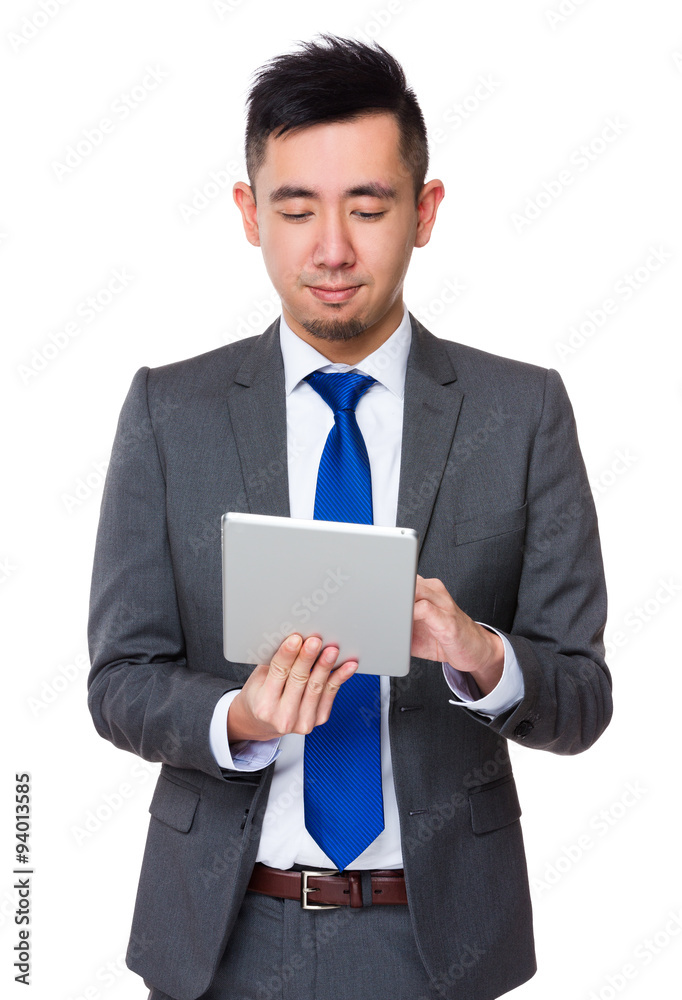 Asian Young Businessman use of the mobile phone Asian Young Businessman use of the mobile phone