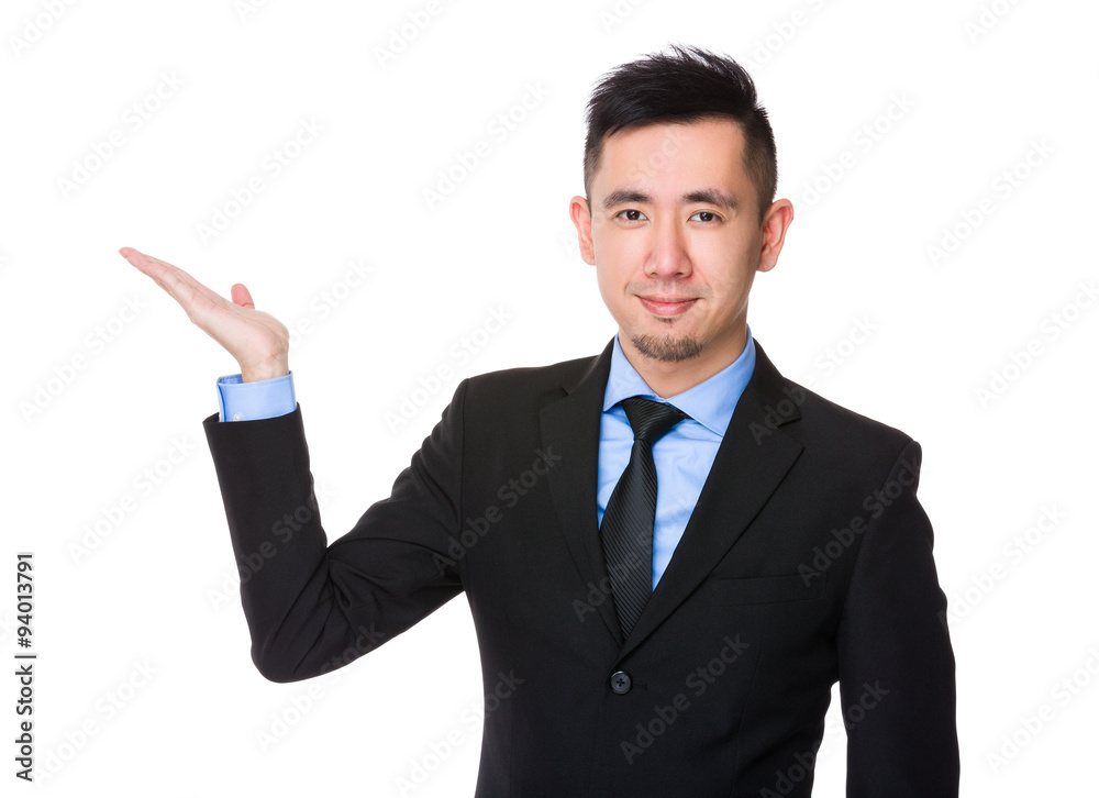 Asian Young Businessman with hand showing blank sign Asian Young Businessman with hand showing blank sign
