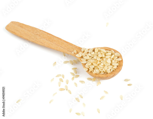 sesame seeds in a wooden spoon