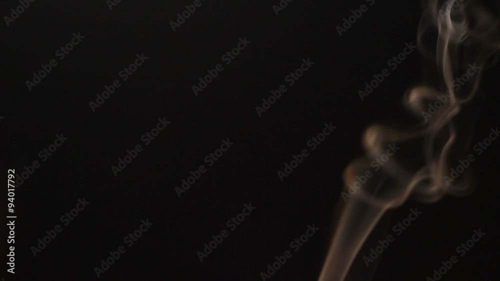 Smoke flowing in the air on a black background. Smoke flowing in the air on a black background.