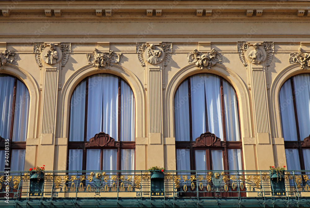 beautiful ornate windows of Municipal House in Prague, Czech Rep