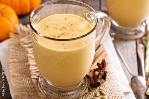 Healthy pumpkin smoothie in big mugs