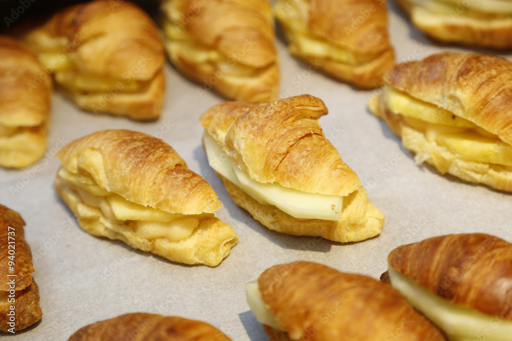 Homemade Triangular puff pastry with cheese in the middle Homemade Triangular puff pastry with cheese in the middle