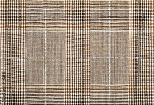 Brown guncheck pattern. Tartan design as background. Checked fabric.