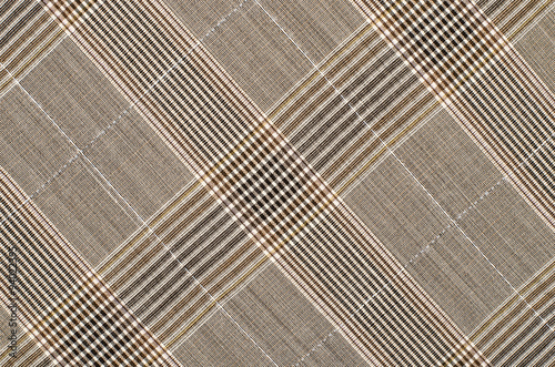 Brown guncheck pattern. Tartan design as background. Checked fabric.